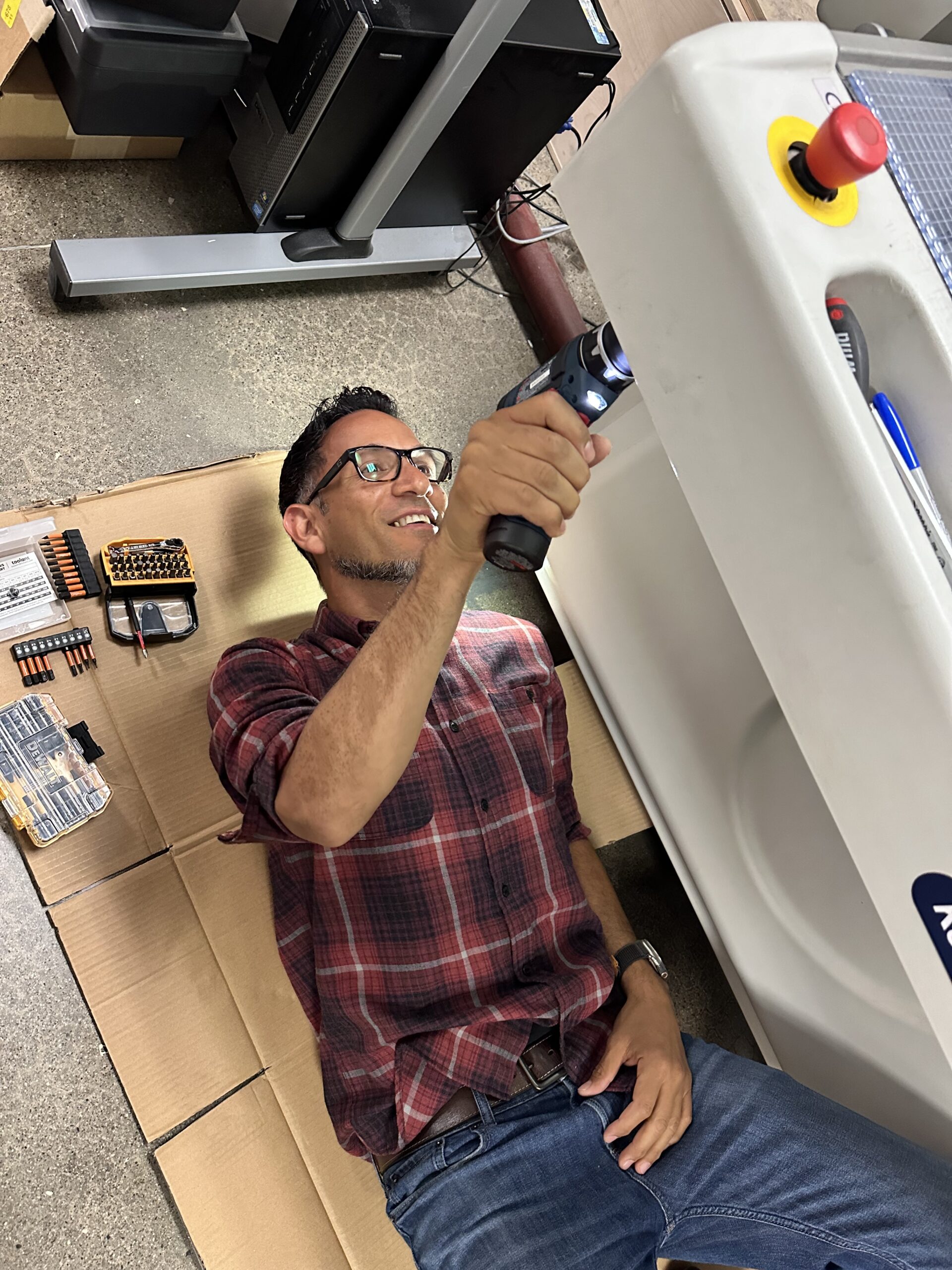 Andy fixing industrial machine